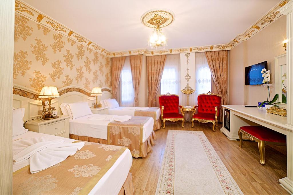 Postel nebo postele na pokoji v ubytování White House Hotel Istanbul