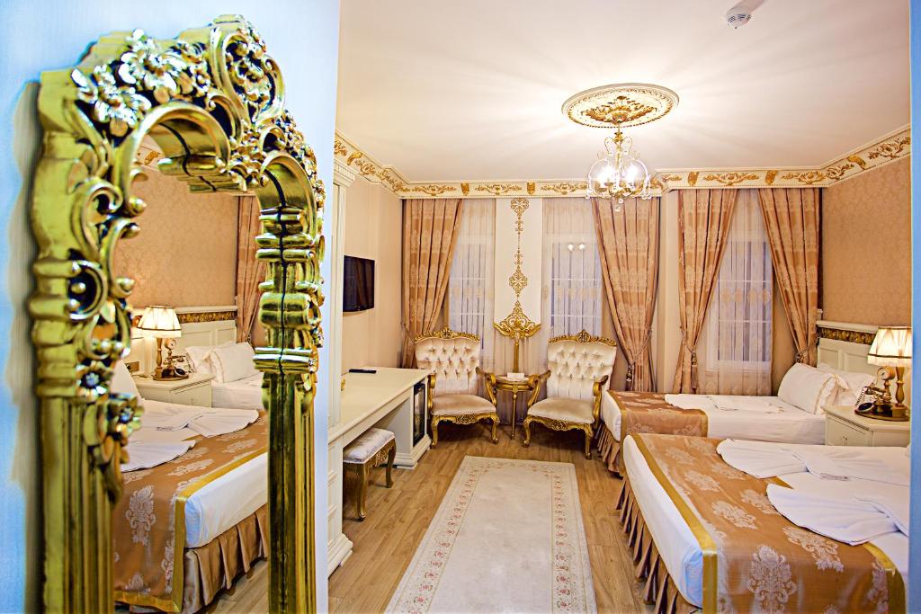 Postel nebo postele na pokoji v ubytování White House Hotel Istanbul