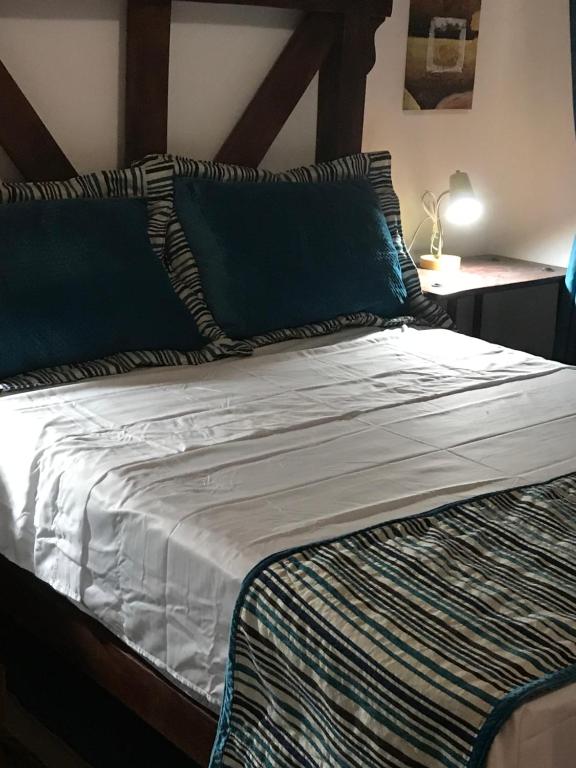 Postel nebo postele na pokoji v ubytování COTTON HOUSE DE LABRADOR