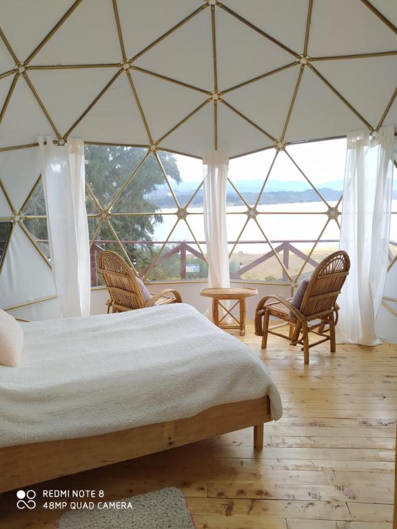 Postel nebo postele na pokoji v ubytování Glamping Chinu