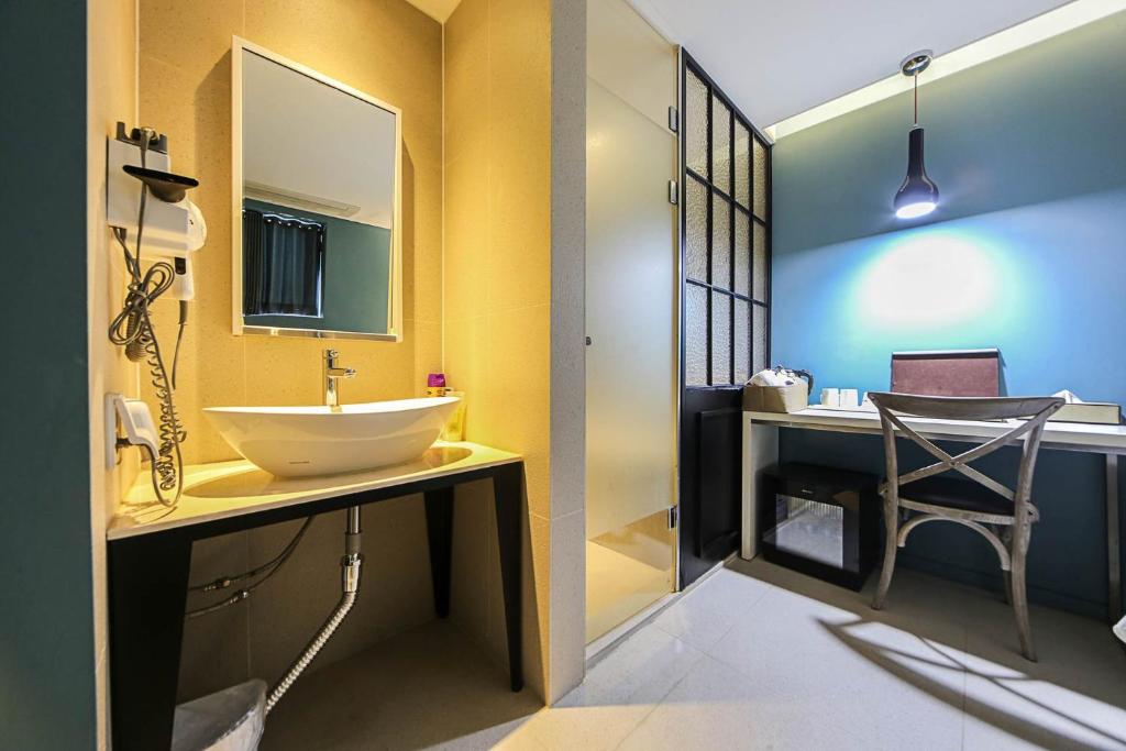 Postel nebo postele na pokoji v ubytování Hotel Myeongjak
