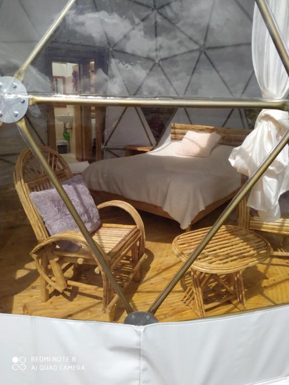 Postel nebo postele na pokoji v ubytování Glamping Chinu