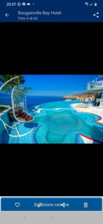 a screenshot of a computer screen of a water slide at Valentino apartments Bouganville Bay Saranda in Sarandë