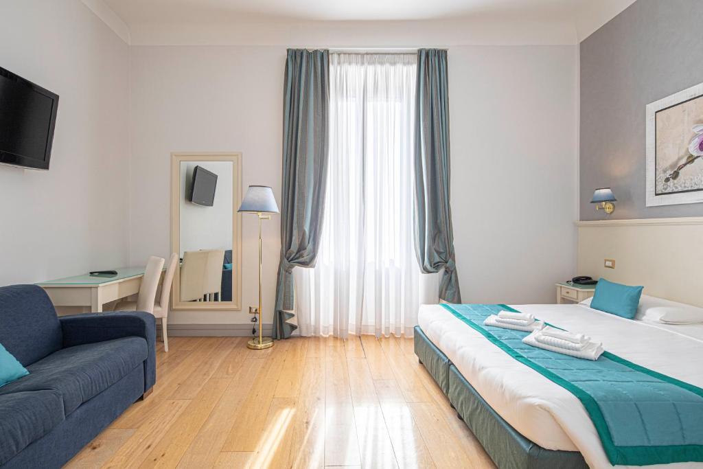 Posteľ alebo postele v izbe v ubytovaní Suite Castrense