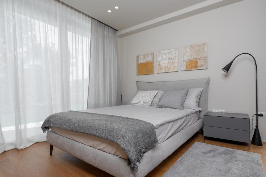 Posteľ alebo postele v izbe v ubytovaní Villa Adoral