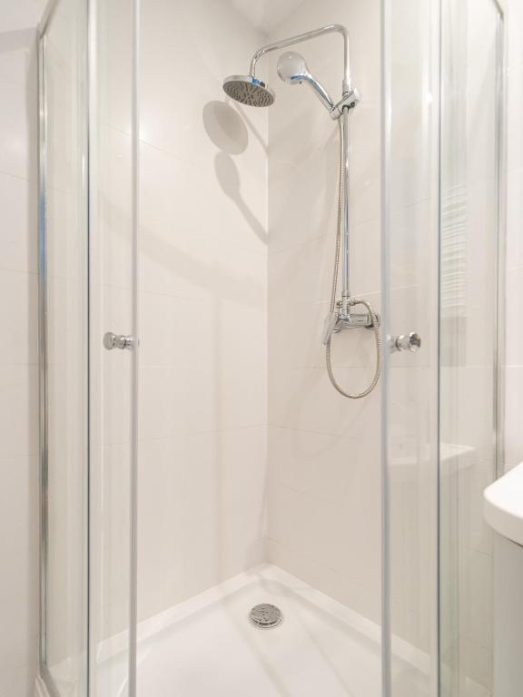 Kúpeľňa v ubytovaní ApartmentyPrzyMorzu Ogrody