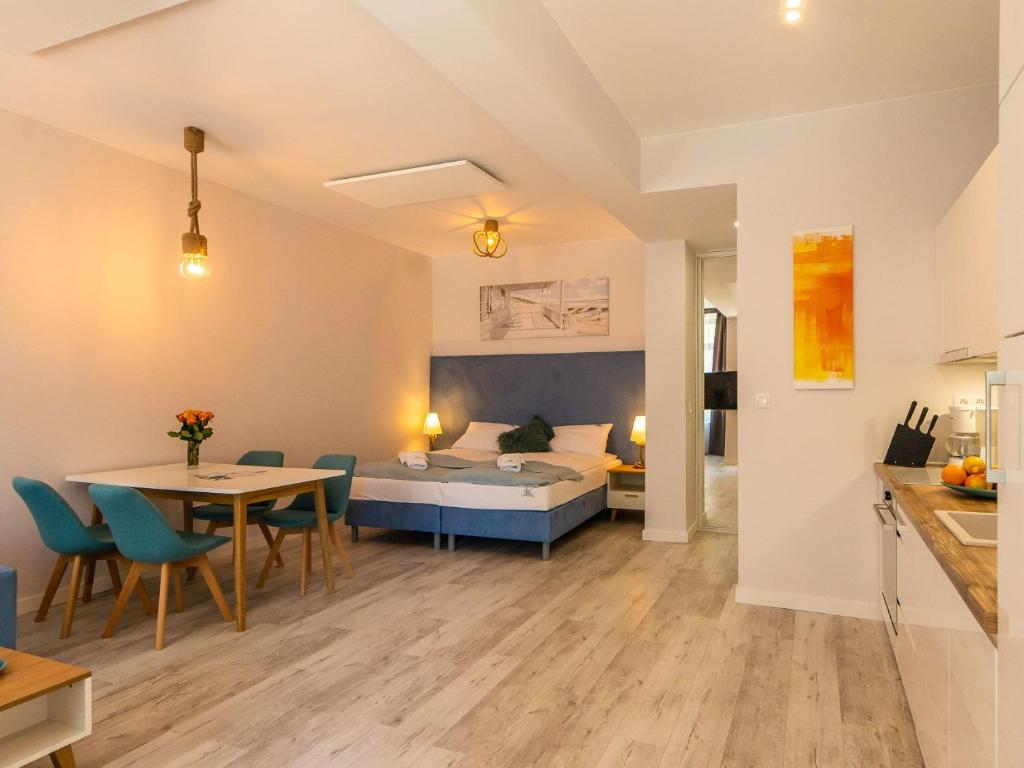 Kuchyňa alebo kuchynka v ubytovaní ApartmentyPrzyMorzu Ogrody
