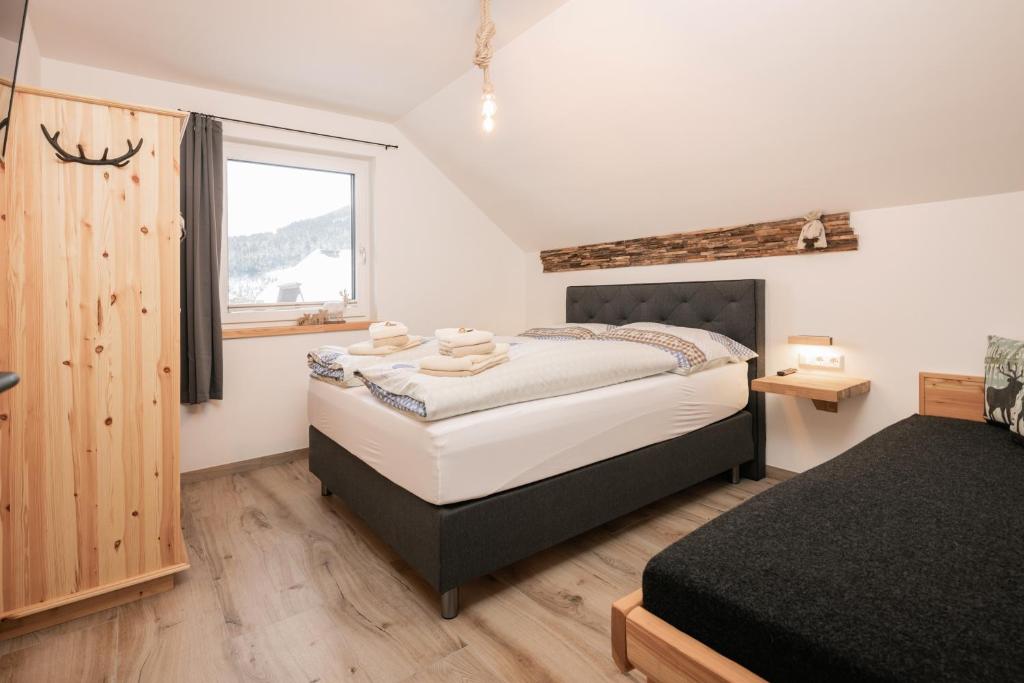 Posteľ alebo postele v izbe v ubytovaní Pistenblick Alpin