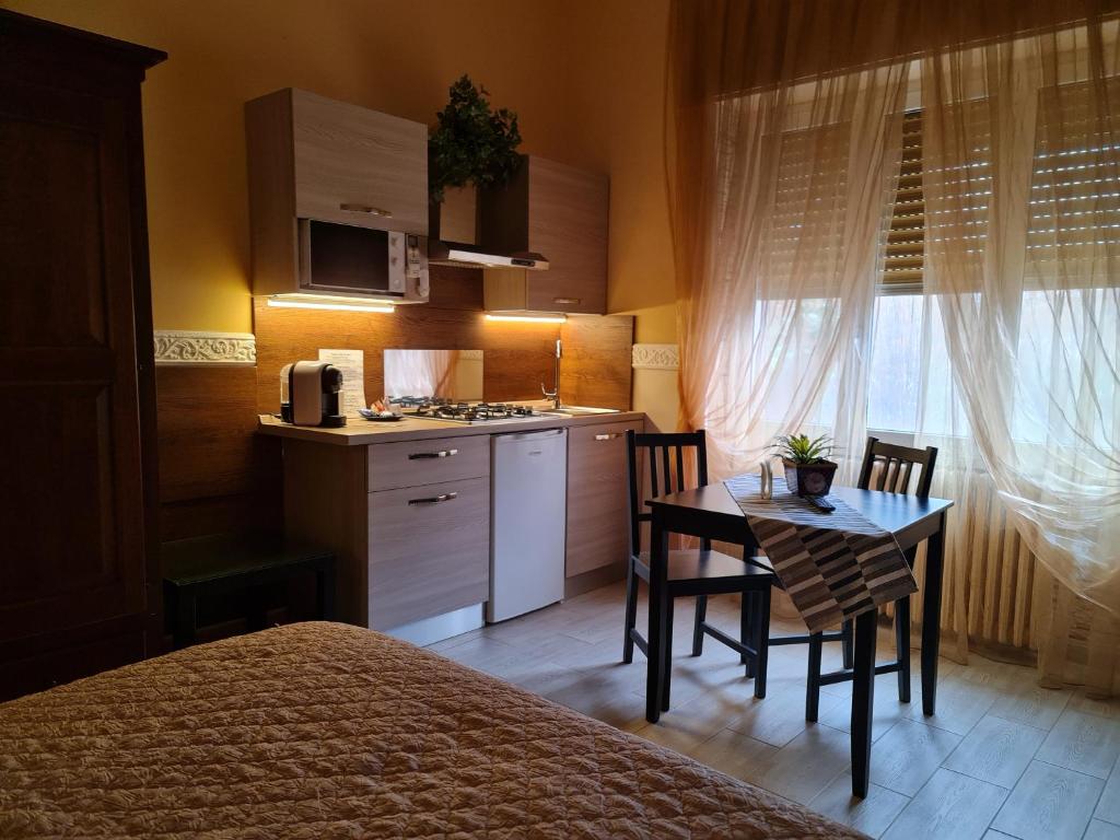 Kuchyň nebo kuchyňský kout v ubytování Taras Di San Vito Guest House