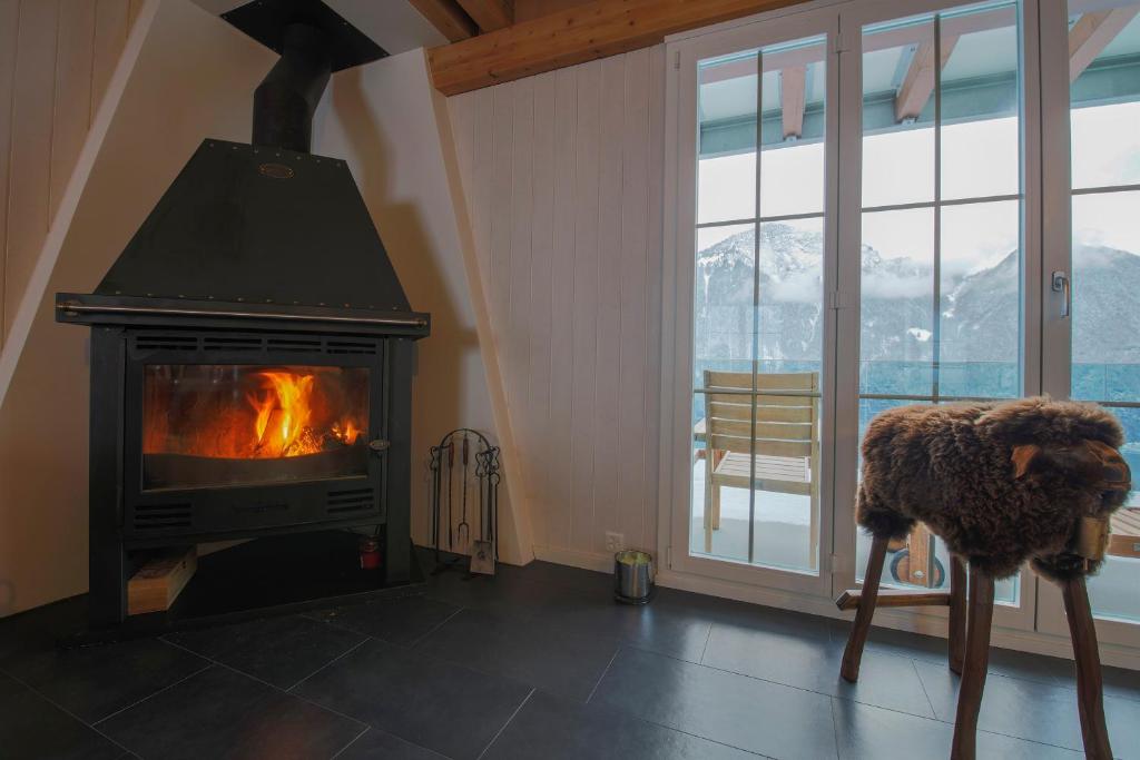 Fotografie z fotogalerie ubytování Exklusives Chalet mit traumhafter See- und Bergsicht v destinaci Seelisberg