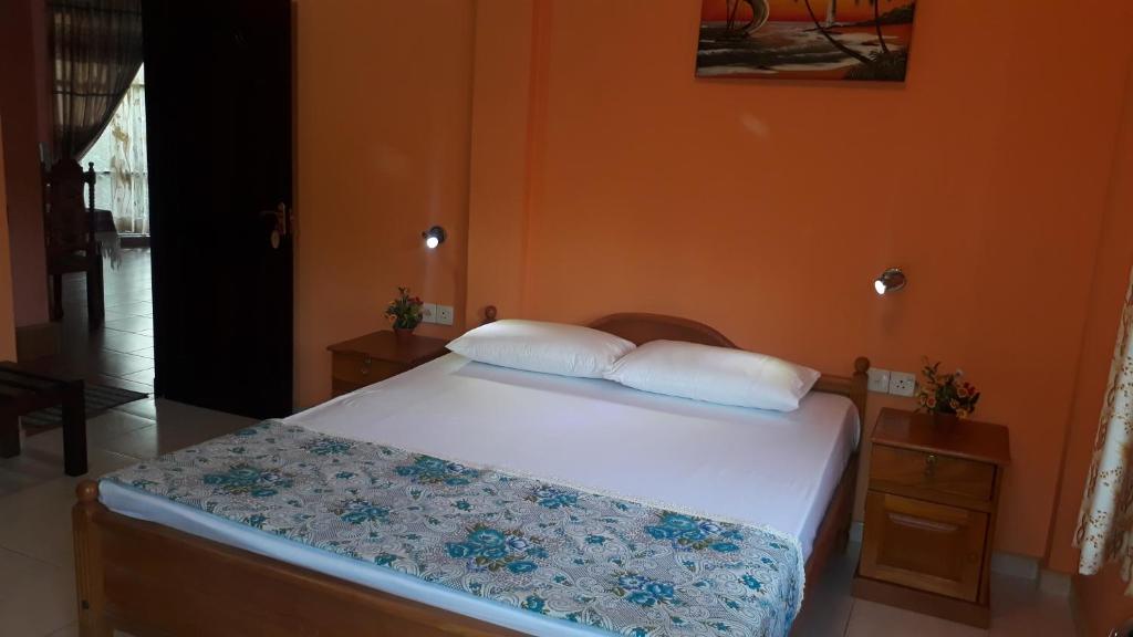 Postel nebo postele na pokoji v ubytování Basilico Homestay