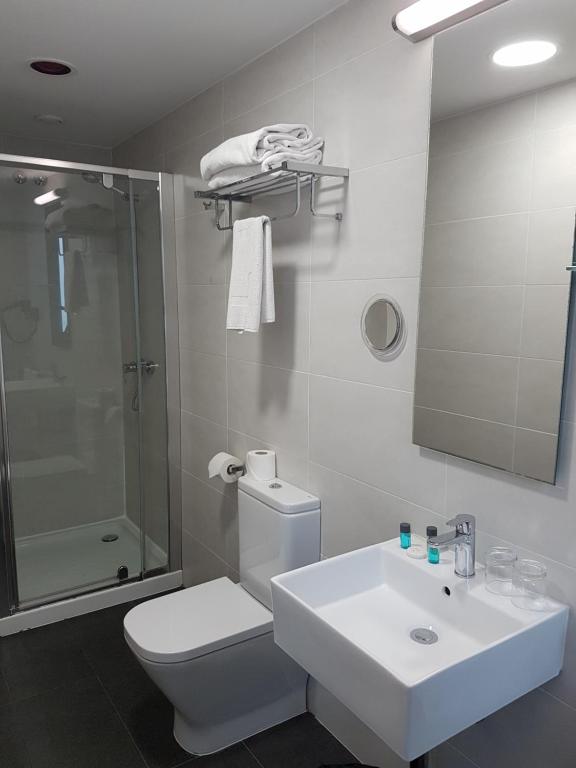 Koupelna v ubytování Hotel Lux Santiago