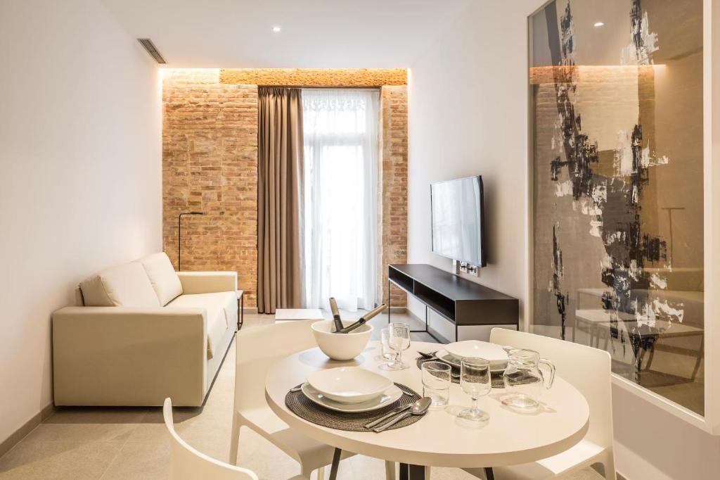 TV a/nebo společenská místnost v ubytování Mon Suites Benlliure