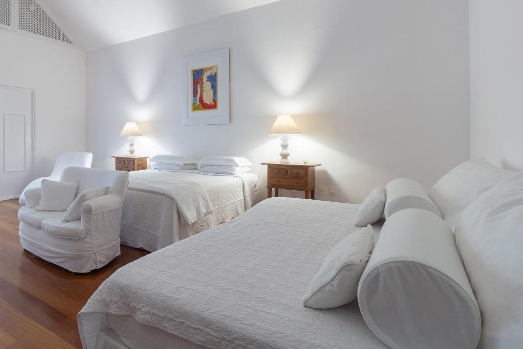 Postel nebo postele na pokoji v ubytování Pousada Casa de Paraty
