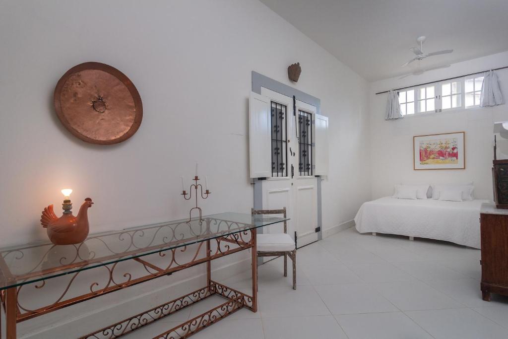 Postel nebo postele na pokoji v ubytování Pousada Casa de Paraty