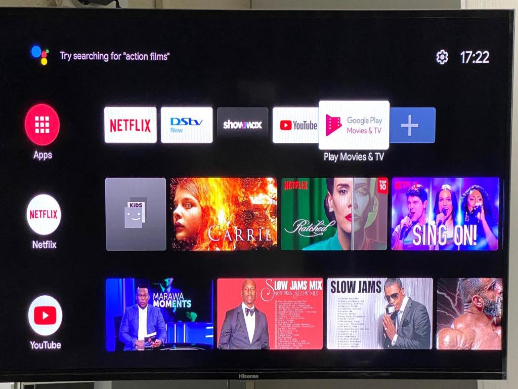 a television screen with a bunch of movies on it at C&C HOTEL VIBES Randpark Ridge JHB 14 Units Available in Boskruin