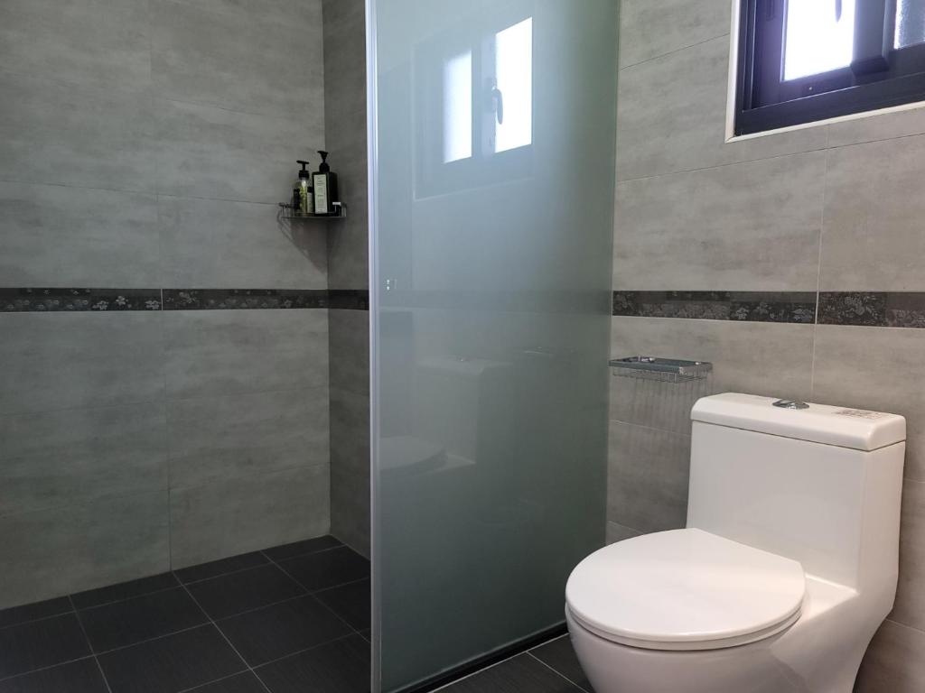 Ένα μπάνιο στο 渡小夜電梯民宿 Yilannight B&B