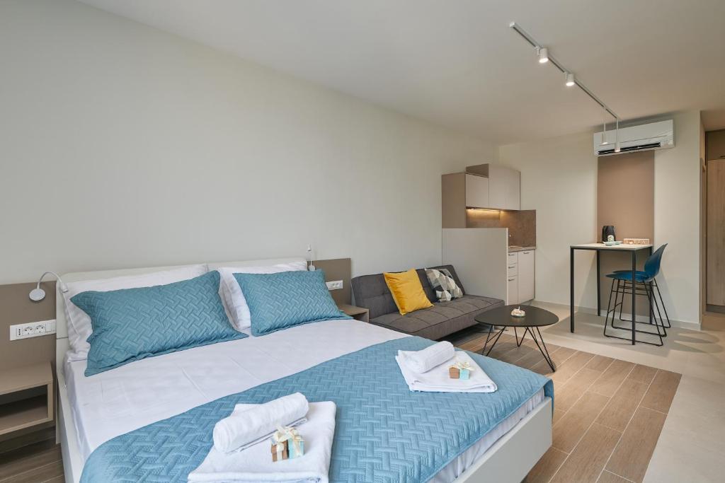 Posteľ alebo postele v izbe v ubytovaní Tiffany Apartments