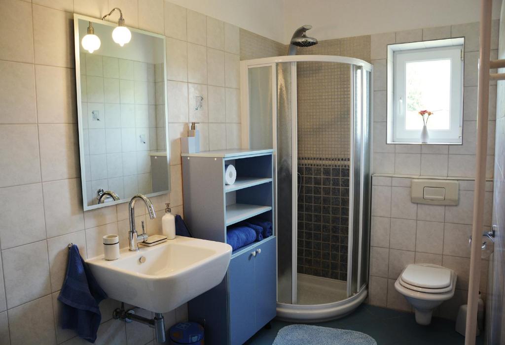 Koupelna v ubytování Villa Gardena with private pool