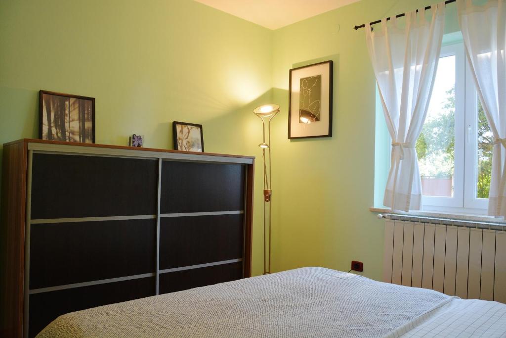 Postel nebo postele na pokoji v ubytování Villa Gardena with private pool