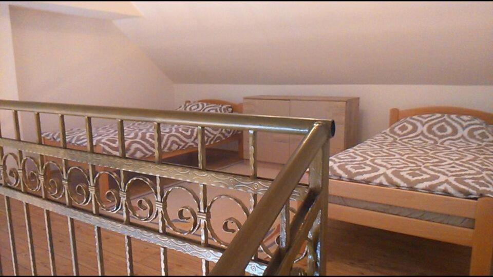 Postel nebo postele na pokoji v ubytování Apartman Sunce Zova