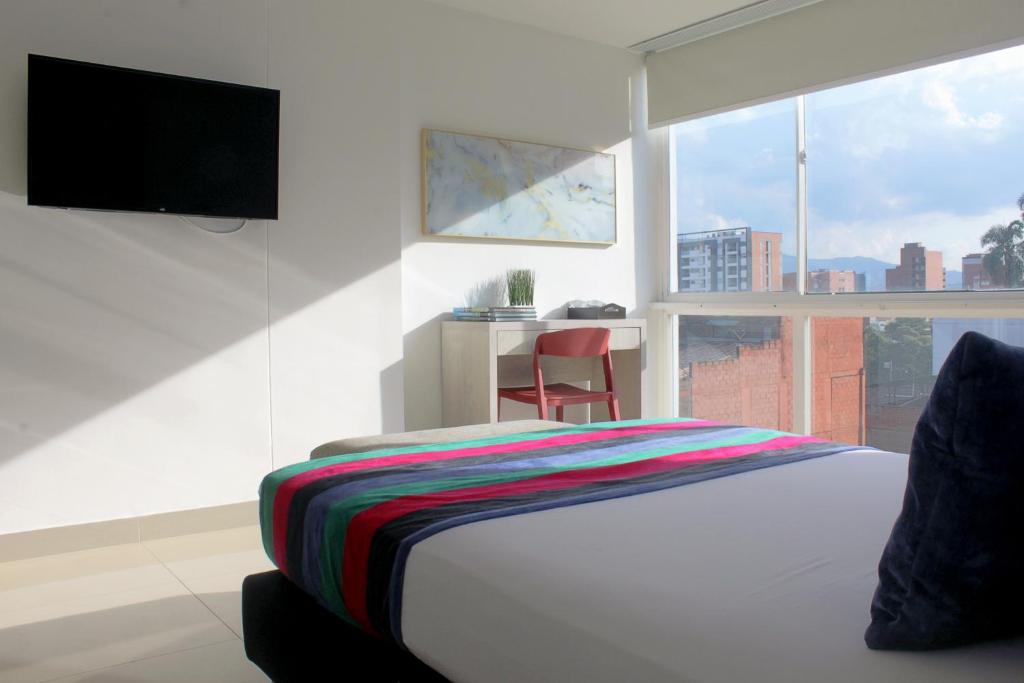 Postel nebo postele na pokoji v ubytování Hotel Suite Comfort