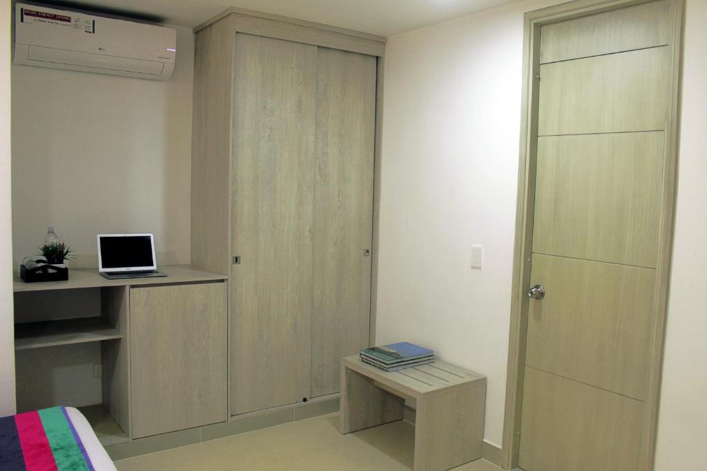 TV a/nebo společenská místnost v ubytování Hotel Suite Comfort