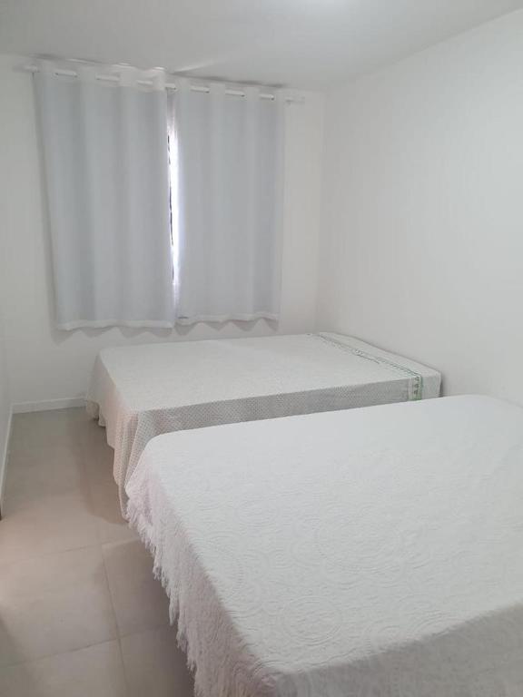  apartamento porto smeralda- guarajuba -na beira da praia