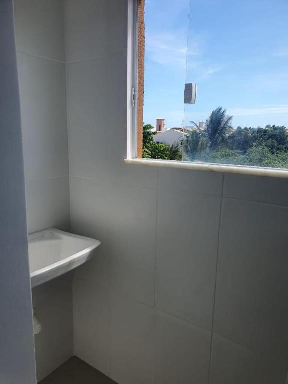  apartamento porto smeralda- guarajuba -na beira da praia