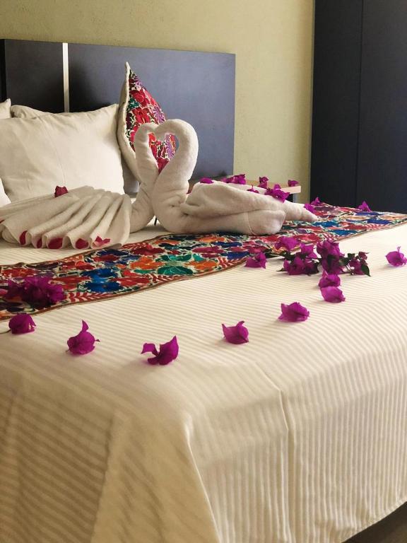 Postel nebo postele na pokoji v ubytování Hotel Real de Minas Tradicional