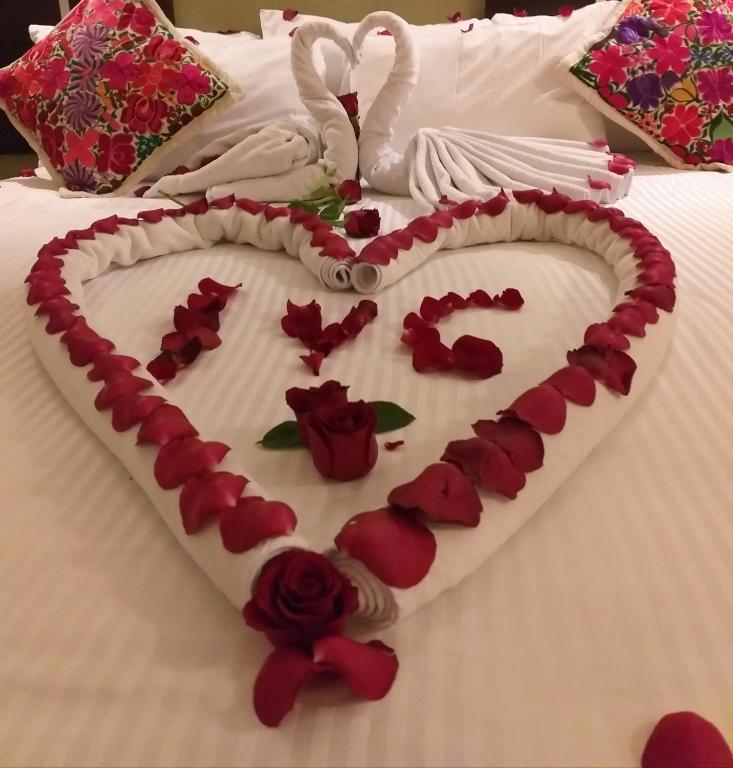 Postel nebo postele na pokoji v ubytování Hotel Real de Minas Tradicional