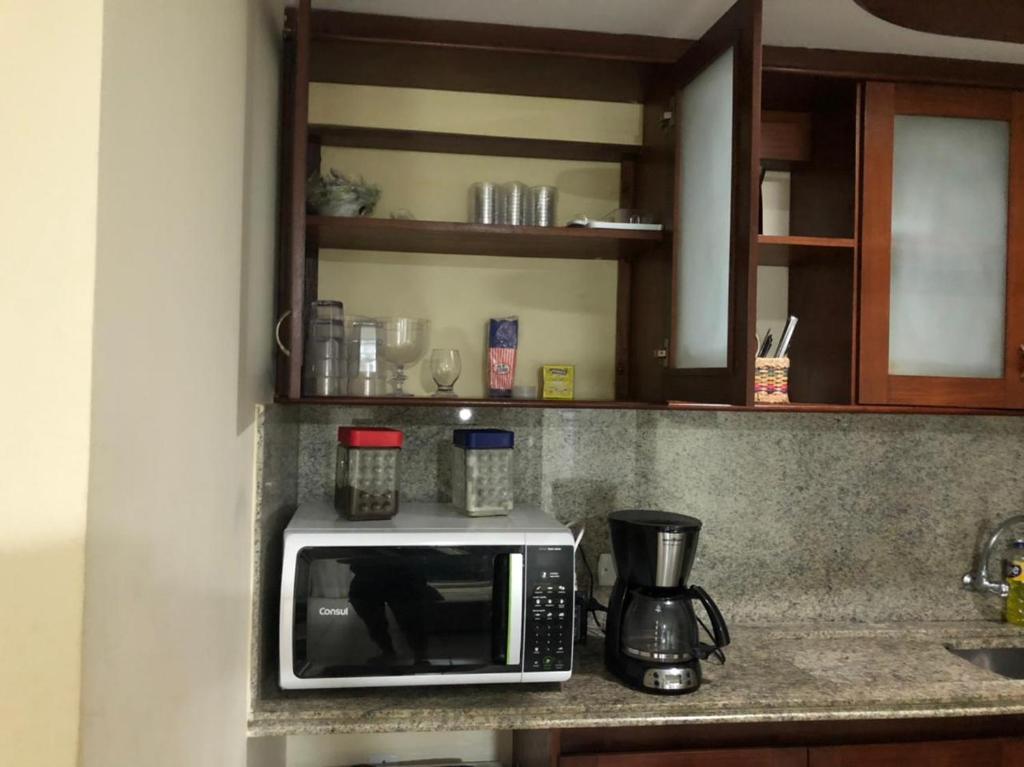  Flat completo a beira mar com vista exuberante no Blue Marlin Apartments