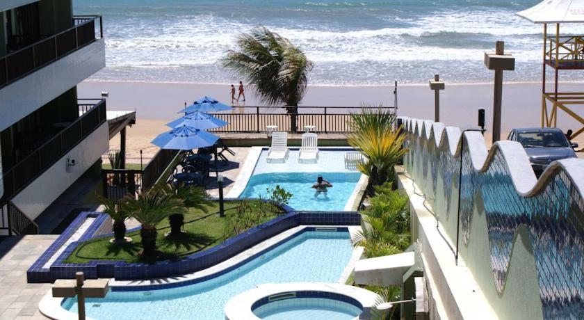  Flat completo a beira mar com vista exuberante no Blue Marlin Apartments