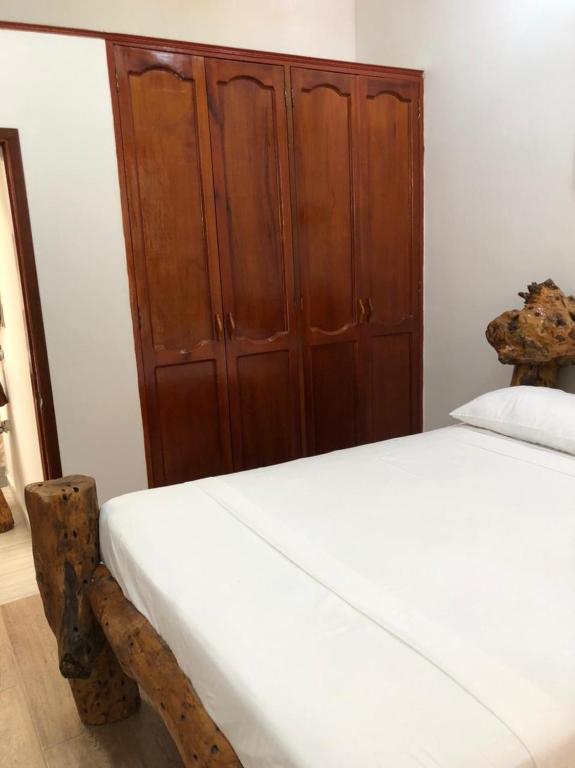 Ліжко або ліжка в номері Eco Hostal Kuima