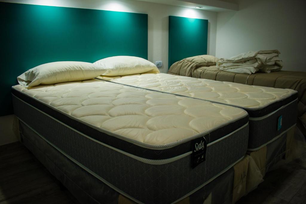 Un ou plusieurs lits dans un hébergement de l'établissement WISZ-V