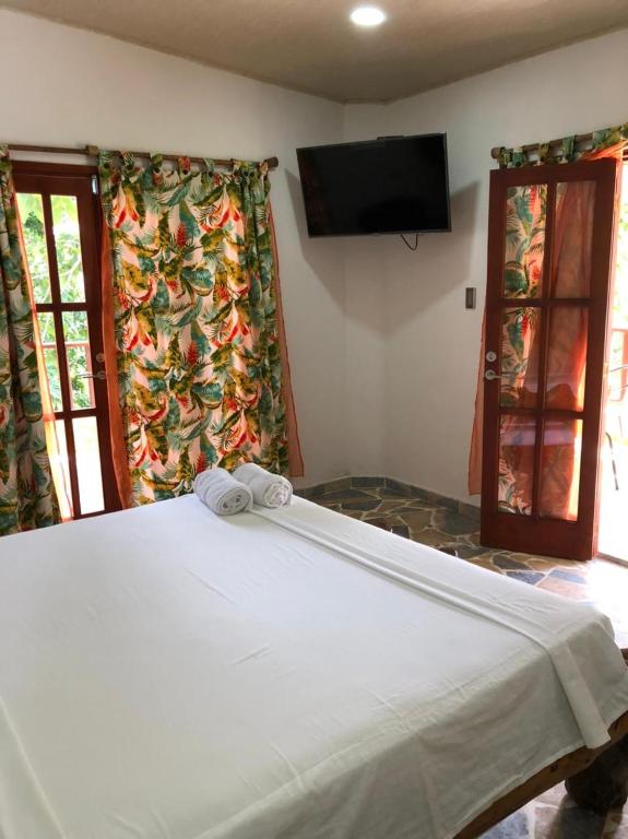 Ліжко або ліжка в номері Eco Hostal Kuima