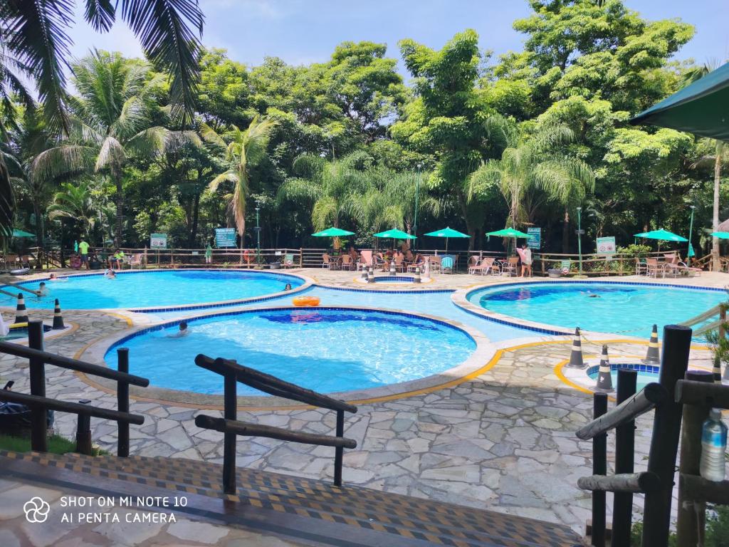 a pool at the resort at Paradise Rio Quente 4QTs in Rio Quente