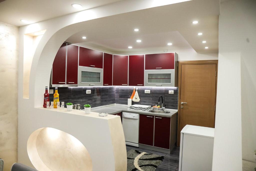 Kuchyňa alebo kuchynka v ubytovaní Apartman Lara