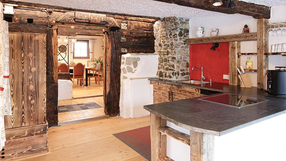 A kitchen or kitchenette at Landhaus Sommerbichl