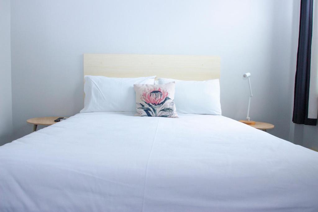 Postel nebo postele na pokoji v ubytování Grand Hotel Rockdale