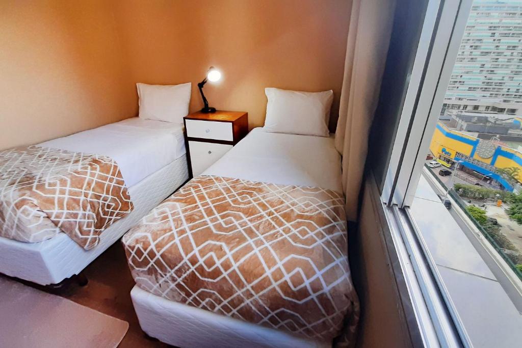  Apto grande com rede de descanso na sala