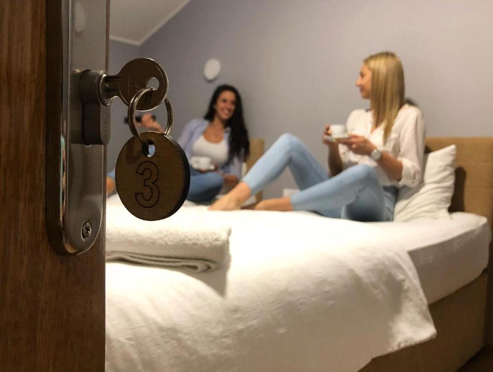 Postel nebo postele na pokoji v ubytování Garni Ideal