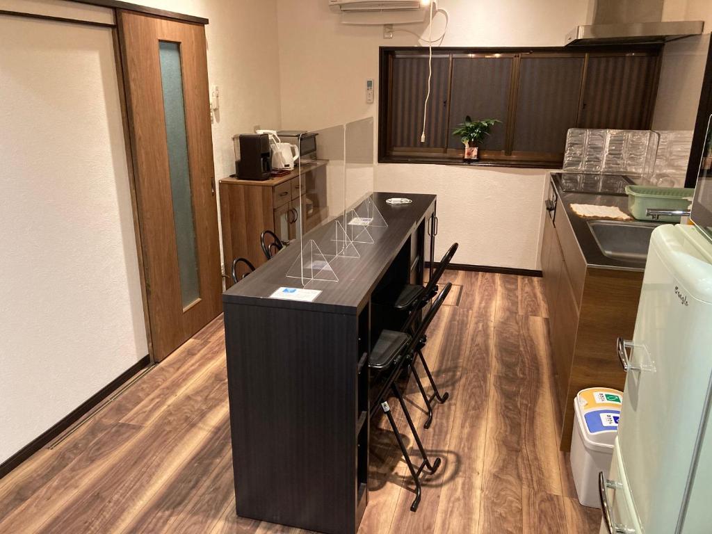 Kuchyň nebo kuchyňský kout v ubytování 松本はなれ Matsumoto HANARE - Japanese style private bedroom Guest hause