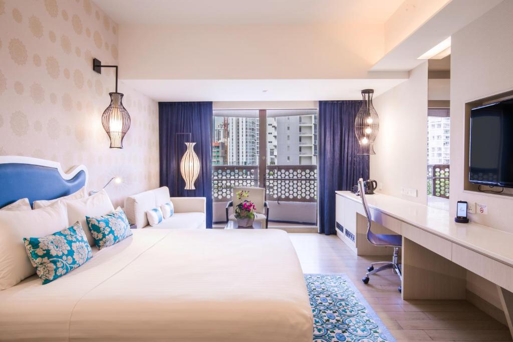 Giường trong phòng chung tại Village Hotel Katong by Far East Hospitality