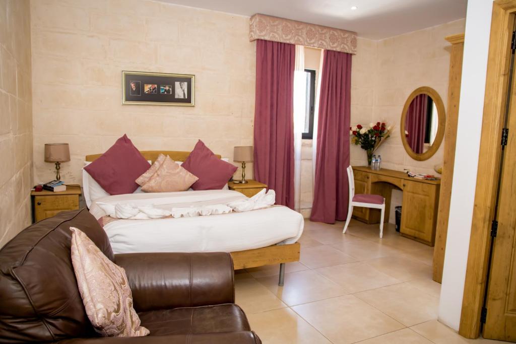 Łóżko lub łóżka w pokoju w obiekcie Point de vue Guesthouse