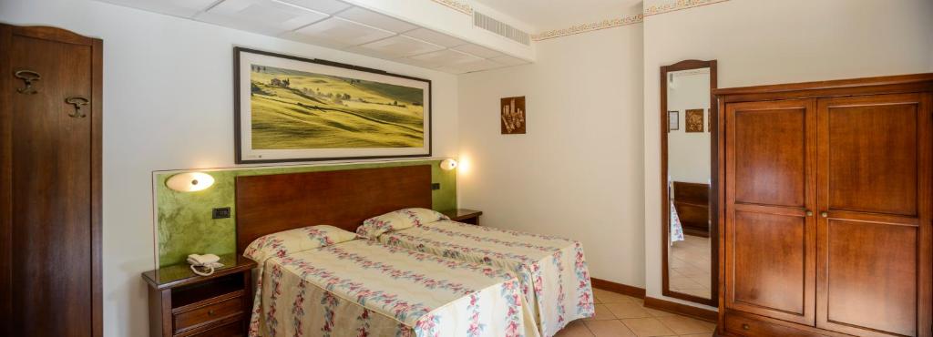 Postel nebo postele na pokoji v ubytování Hotel Sovestro