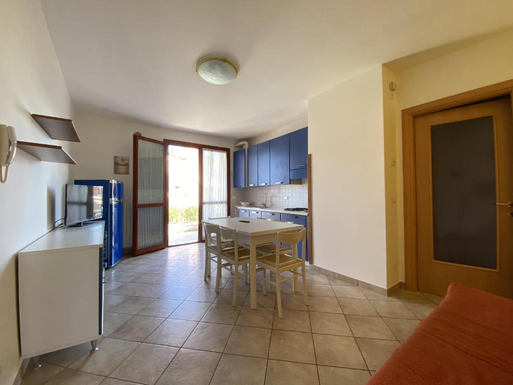 A kitchen or kitchenette at Immobiliare JVL - Le Ginestre