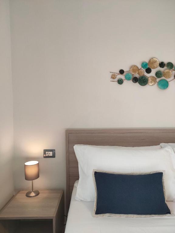 Postel nebo postele na pokoji v ubytování Albergo La Pescatrice