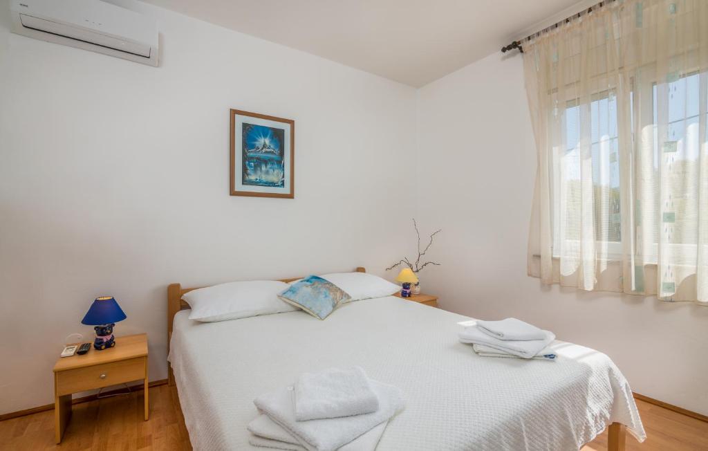 Postel nebo postele na pokoji v ubytování Rooms Valentino