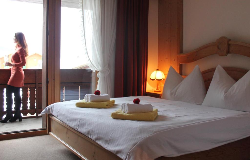 Postel nebo postele na pokoji v ubytování Sporthotel Oberwald